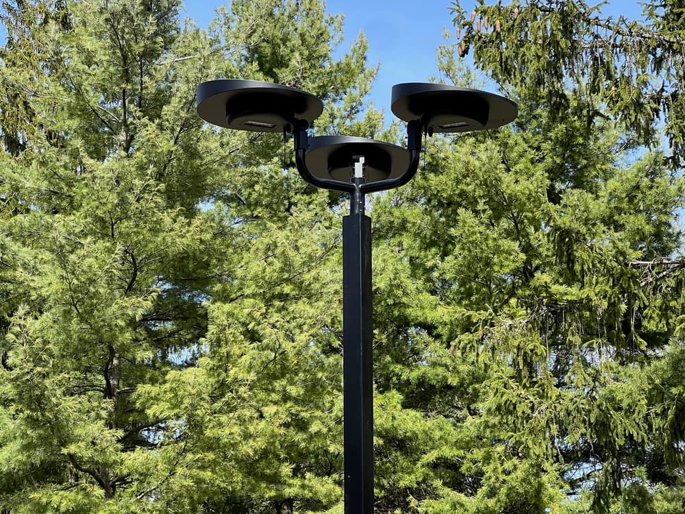 Triple-mounted Senti solar lights along the Queenston waterfront